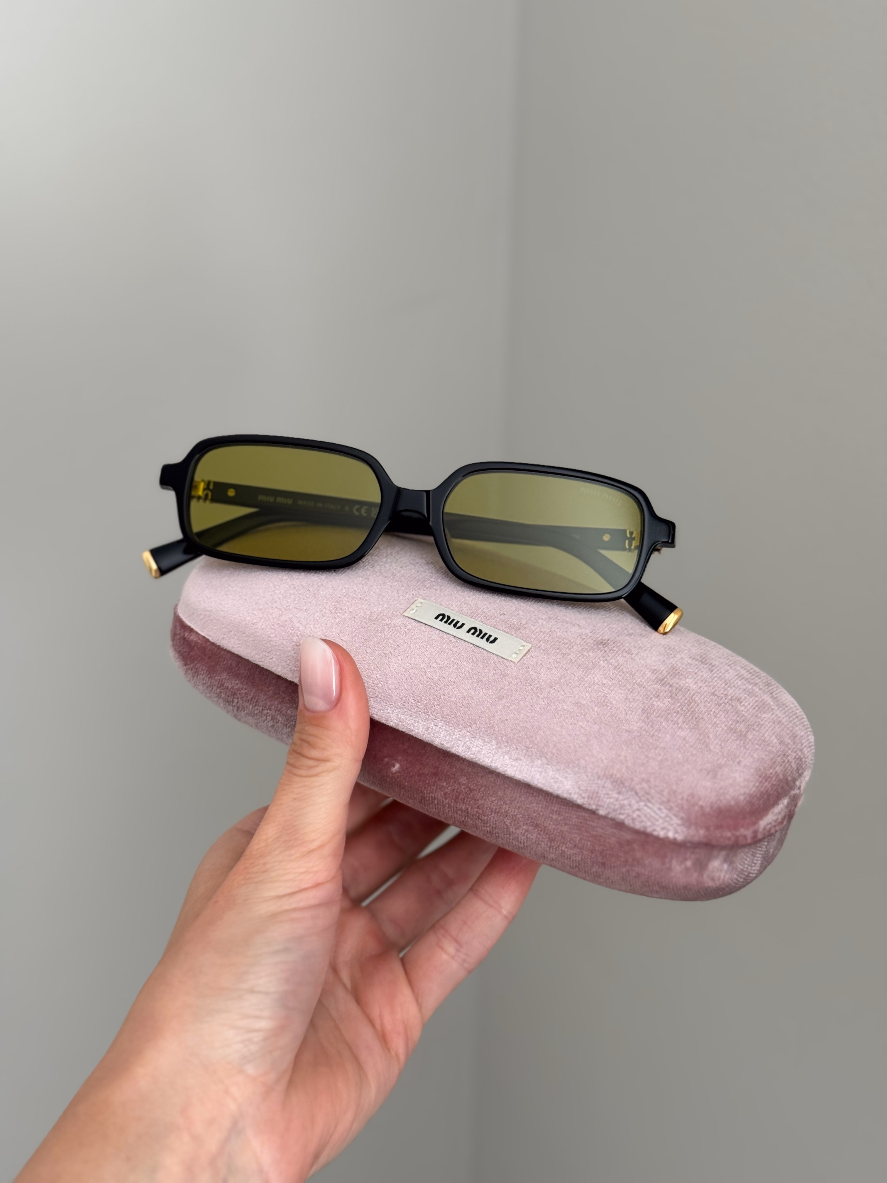 Miu Miu MU11ZSF Black / Olive Green Sunglasses product photo 1